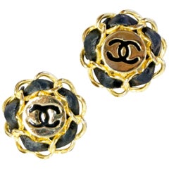 Vintage Iconic 1980s Chanel Logo Gold and Leather Clip Earrings