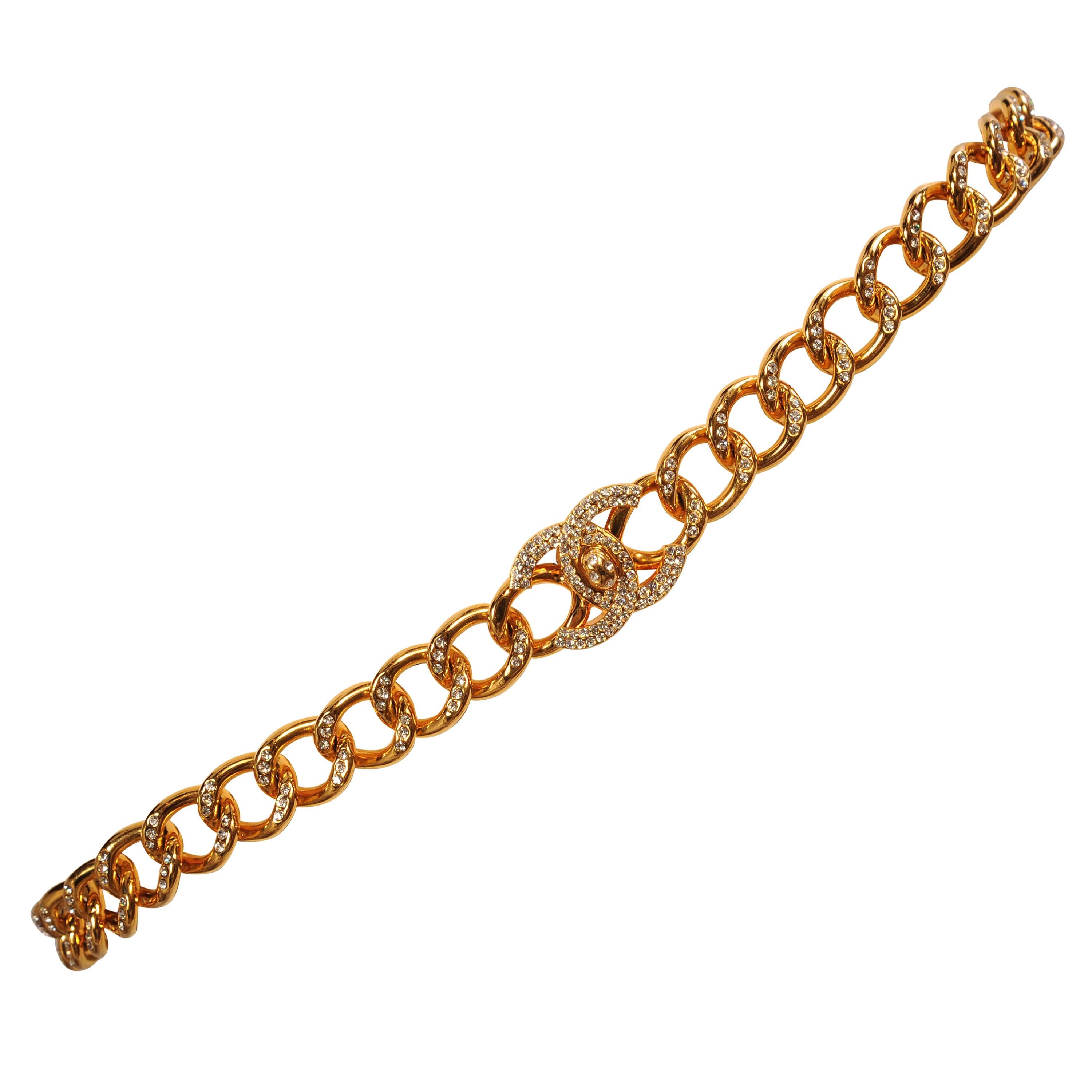 Pristine, with the original box and hang tag, this stunning Chanel belt appears to have never been worn. Each of the links is studded with diamond like stones as is the buckle and turnlock clasp. It works equally well as a necklace and it is in