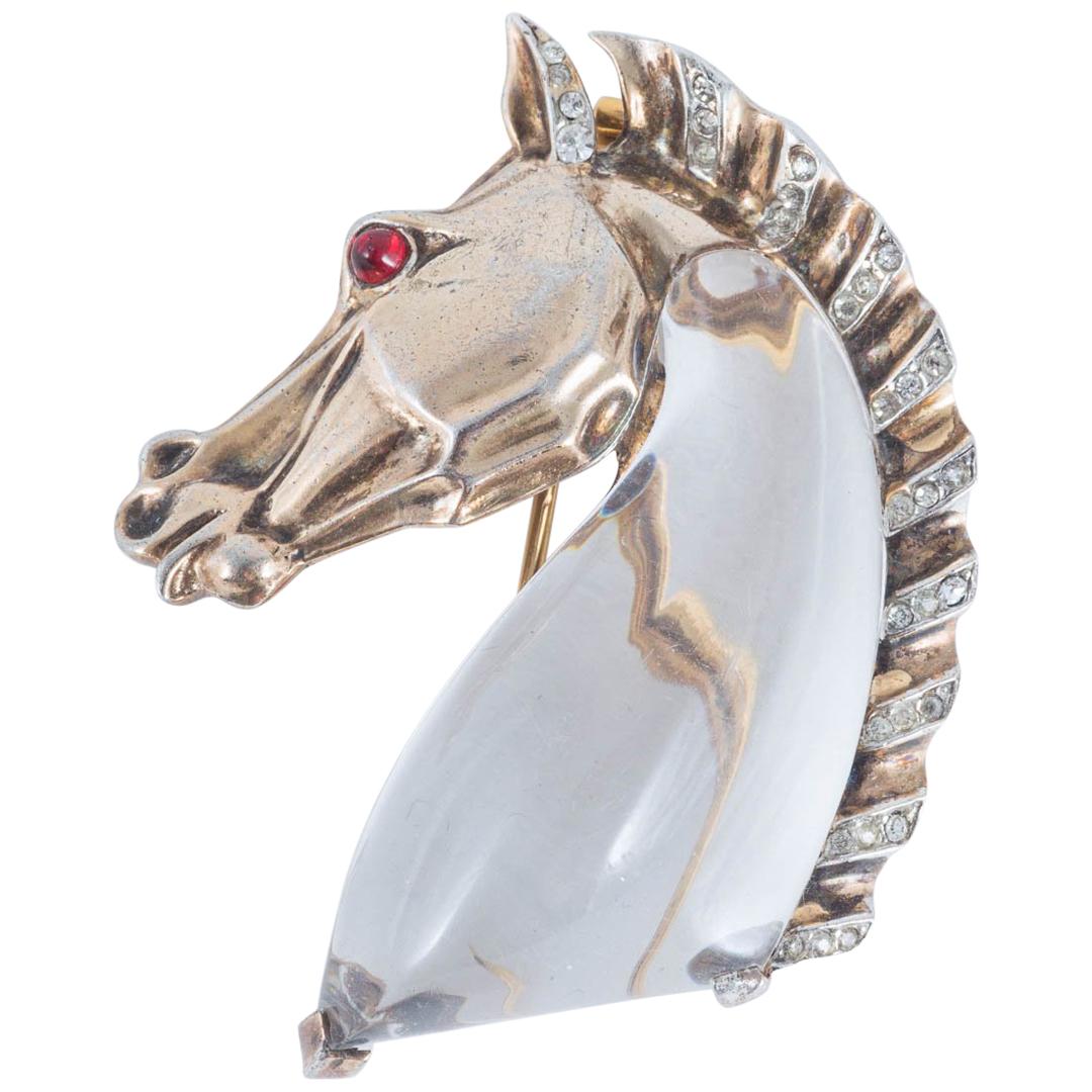 Silver gilt, clear paste, lucite 'Horse Head' jellybelly brooch, Trifari, 1940s