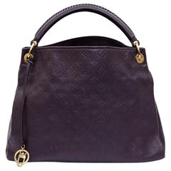 Used LOUIS VUITTON Artsy MM Bag in Grape Embossed Empreinte Monogram Leather