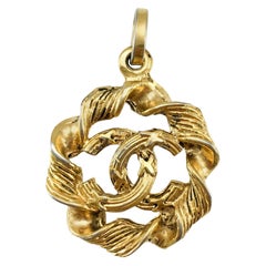 1970
s Chanel Gilt Logo Pendant