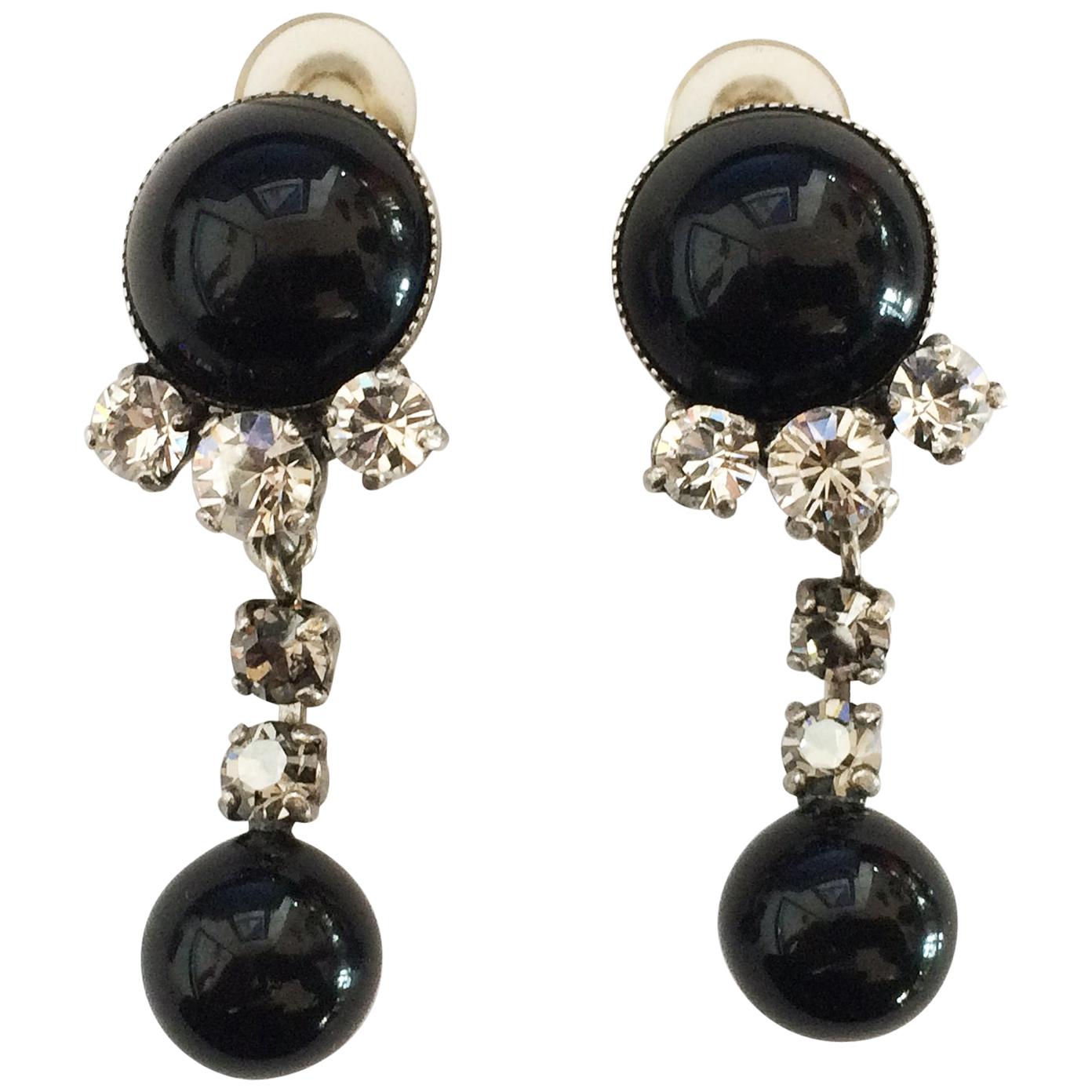 A Pair of Mid Century Onyx and Diamante earrngs by Jaques Fath For Sale