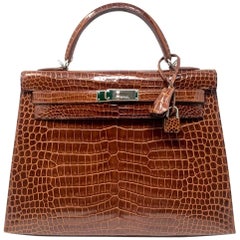 Sac Hermès KELLY 32 Sellier en cuir croco Porosus Miel, 2009