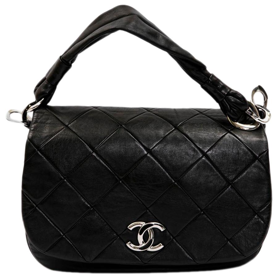 CHANEL Flap Bag in Black Quilted Lambskin Leather