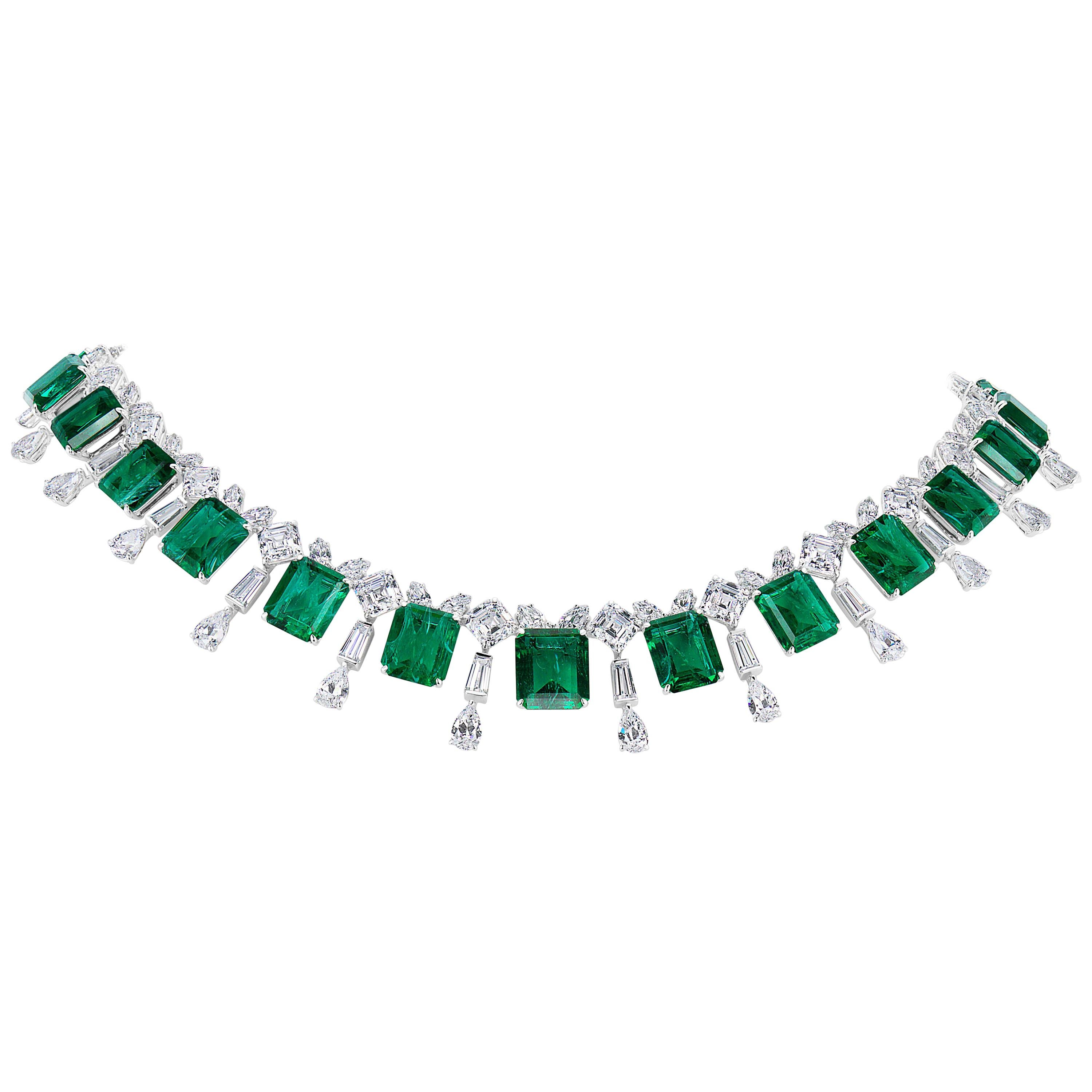 Magnificent Costume Jewelry Emerald Diamond La Grande Soiree Necklace Made with 19 Man-Made Square Graduated 'Flawed' Emeralds; Marquise, Square Cut, Taper Baguette and Pear Shaped  Cubic Zirconias hand-set in Rhodium Sterling Silver measures 16 1/2