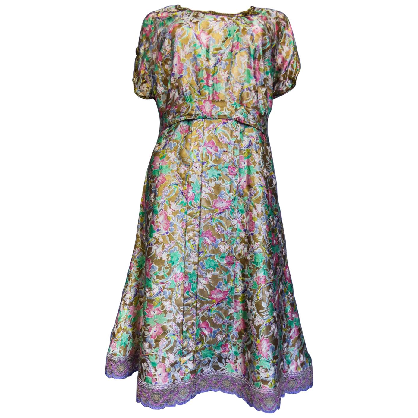A French Gold Printed and painted Satin Dress Circa 1940-1950