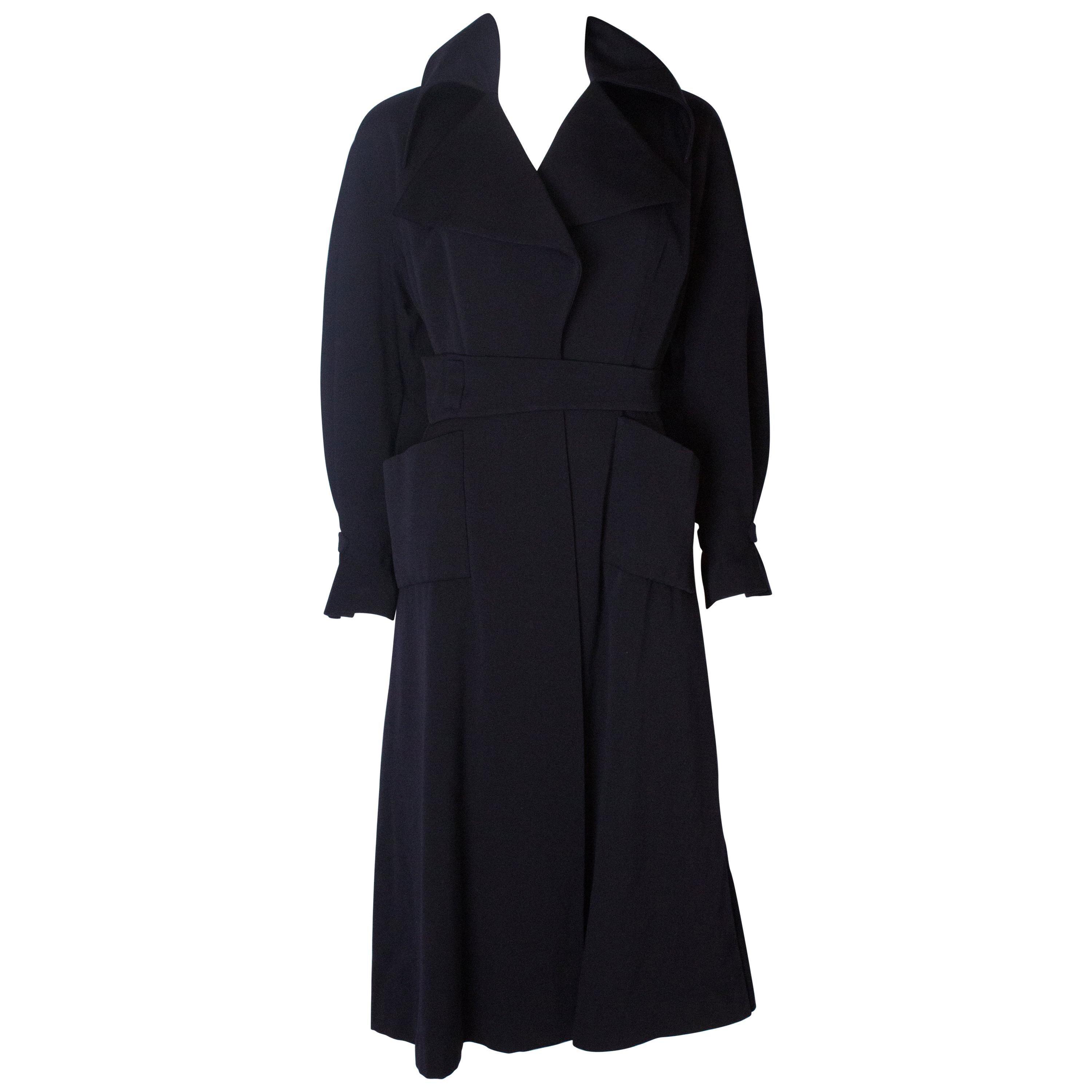 A Vintage 1950s dark navy tailored Coat by Simon Massey