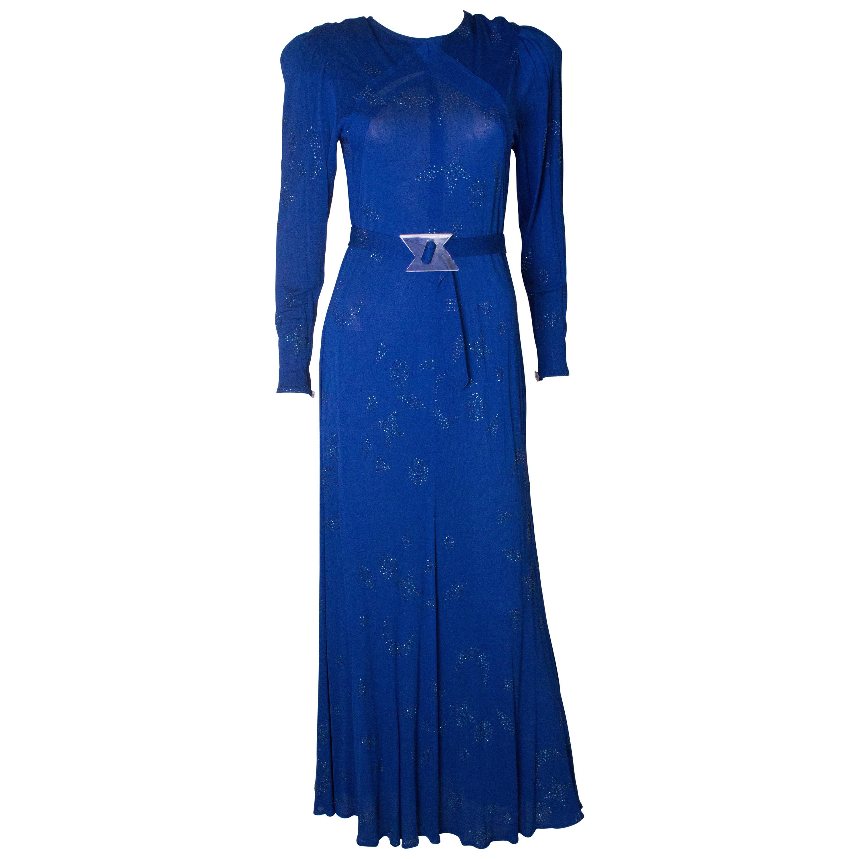 A vintage 1970s electric blue and beaded evening gown by Jean Muir 