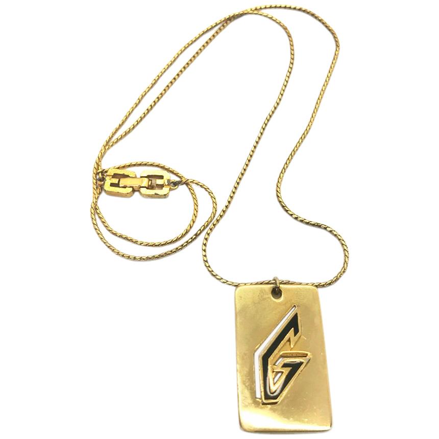Givenchy 1970s Gold Plated G Logo Pendant Necklace   For Sale