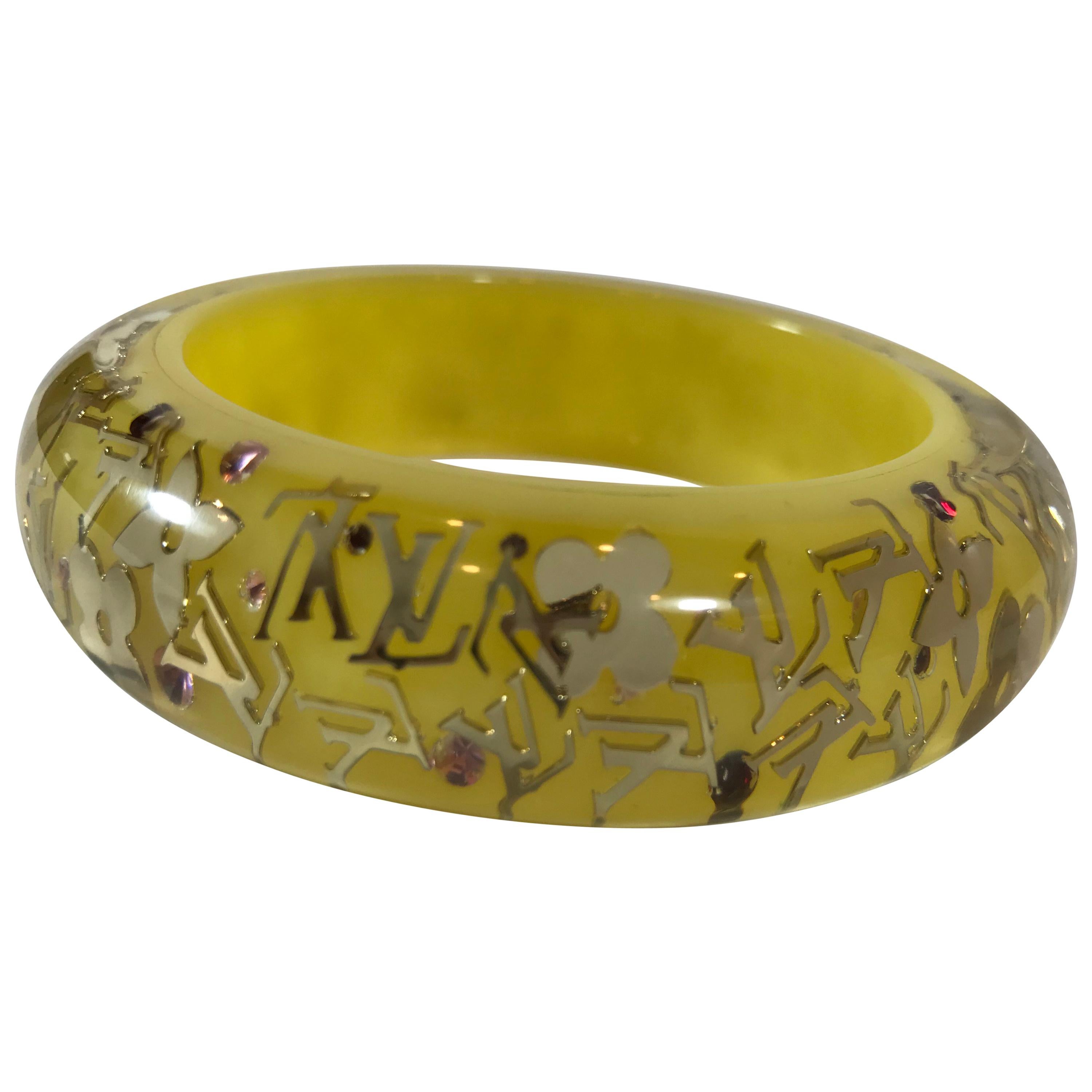 Sold at Auction: Louis Vuitton Black and Gold Inclusion Resin Bangle