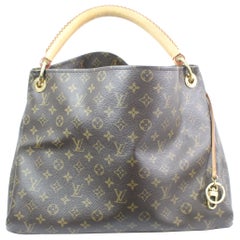 Louis Vuitton Artsy Monogram Canvas Bag.