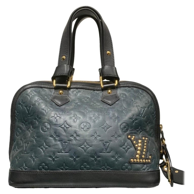 Louis Vuitton Black Monogram Revelation Neo Papillon GM Bag For Sale at  1stDibs