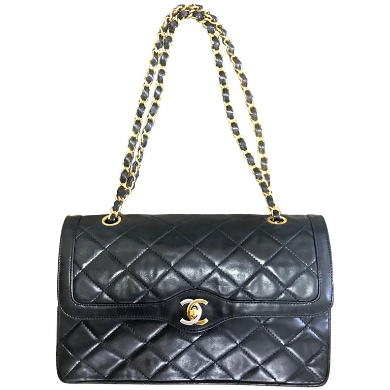 Vintage Chanel black 2.55 double flap chain bag with gold and silver CC.  Paris For Sale at 1stDibs | chanel gold and silver chain bag, chanel bag  gold and silver chain, chanel