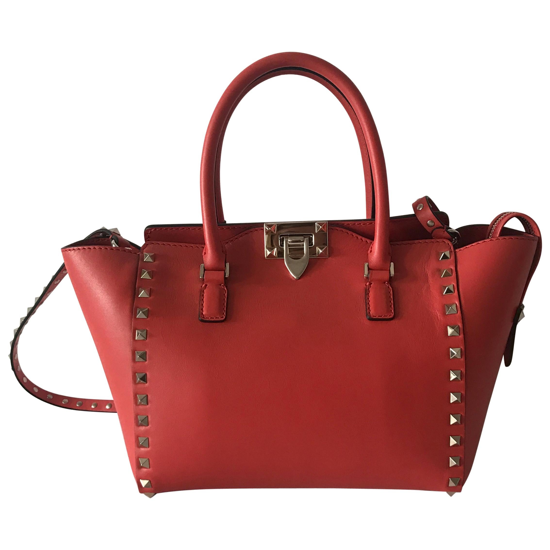 Valentino small rockstud leather handbag in cherry red 