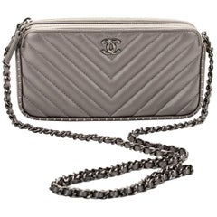 New in box, Chanel Pewter Chevron Crossbody Bag