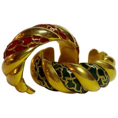Pair of Gilt Clad Red and Green Bakelite Cuff Bracelets