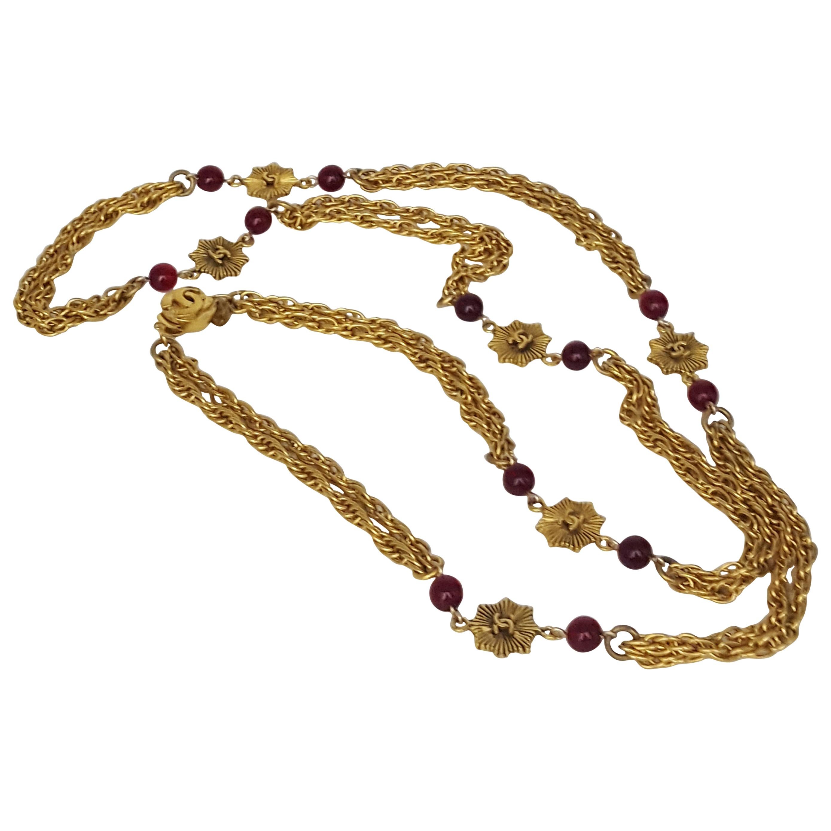 Chanel Vintage Gripoix Ruby And Logo Necklace In Beautiful Gold Tone From 1984 For Sale