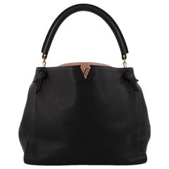  Louis Vuitton Tournon Handbag Leather