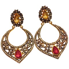 Boucles d'oreilles Taj en cristal et faux rubis 