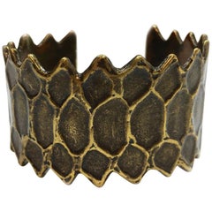 YSL’s Vintage Cuff Bronze Coloring Metal