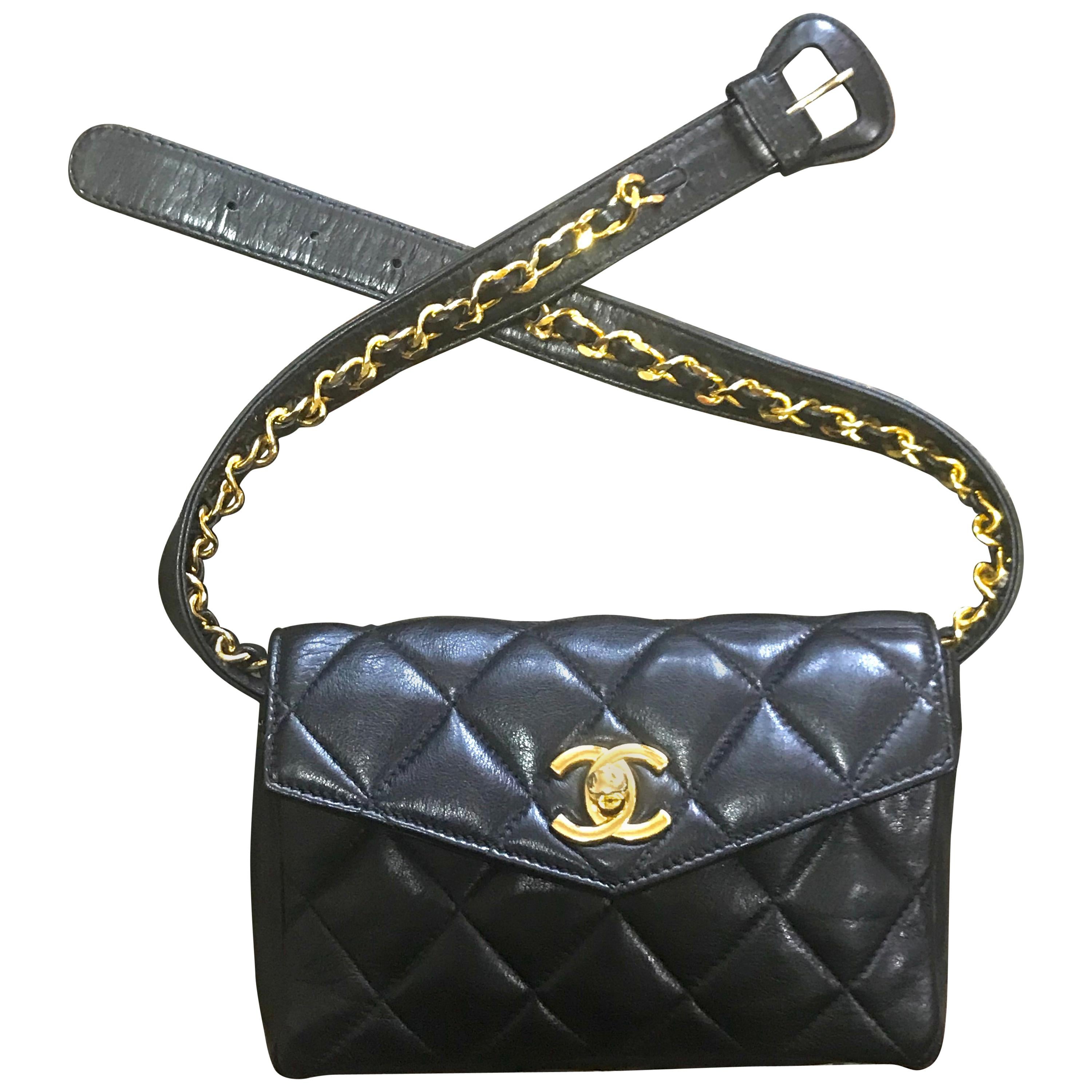 Vintage CHANEL black belt bag, fanny pack with golden chain belt and CC. 28”-30”