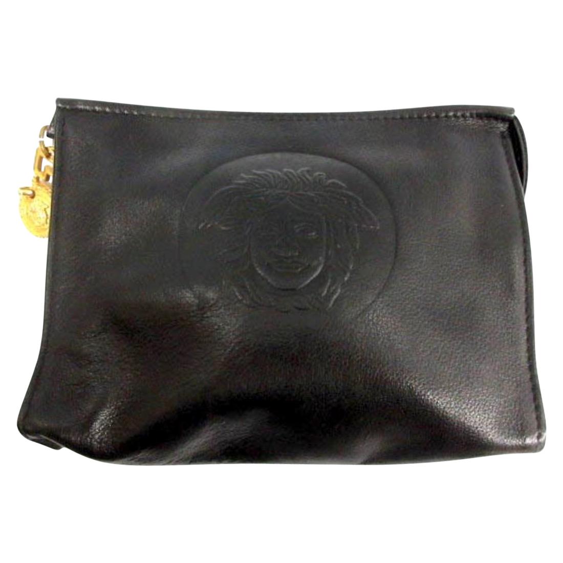 Vintage Gianni Versace black leather clutch purse, pouch, case bag with medusa.