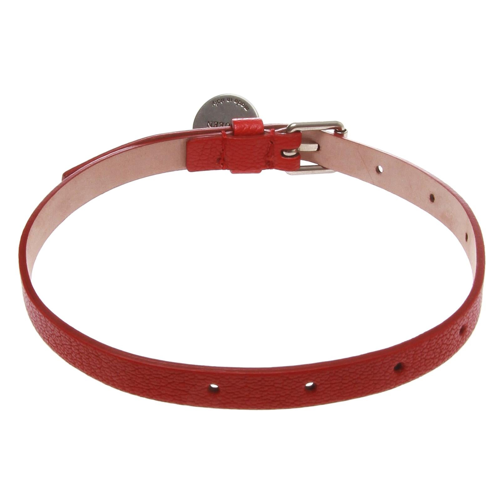 Alexandra Mcqueen red leather bracelet with small skull pendant with glass eyes