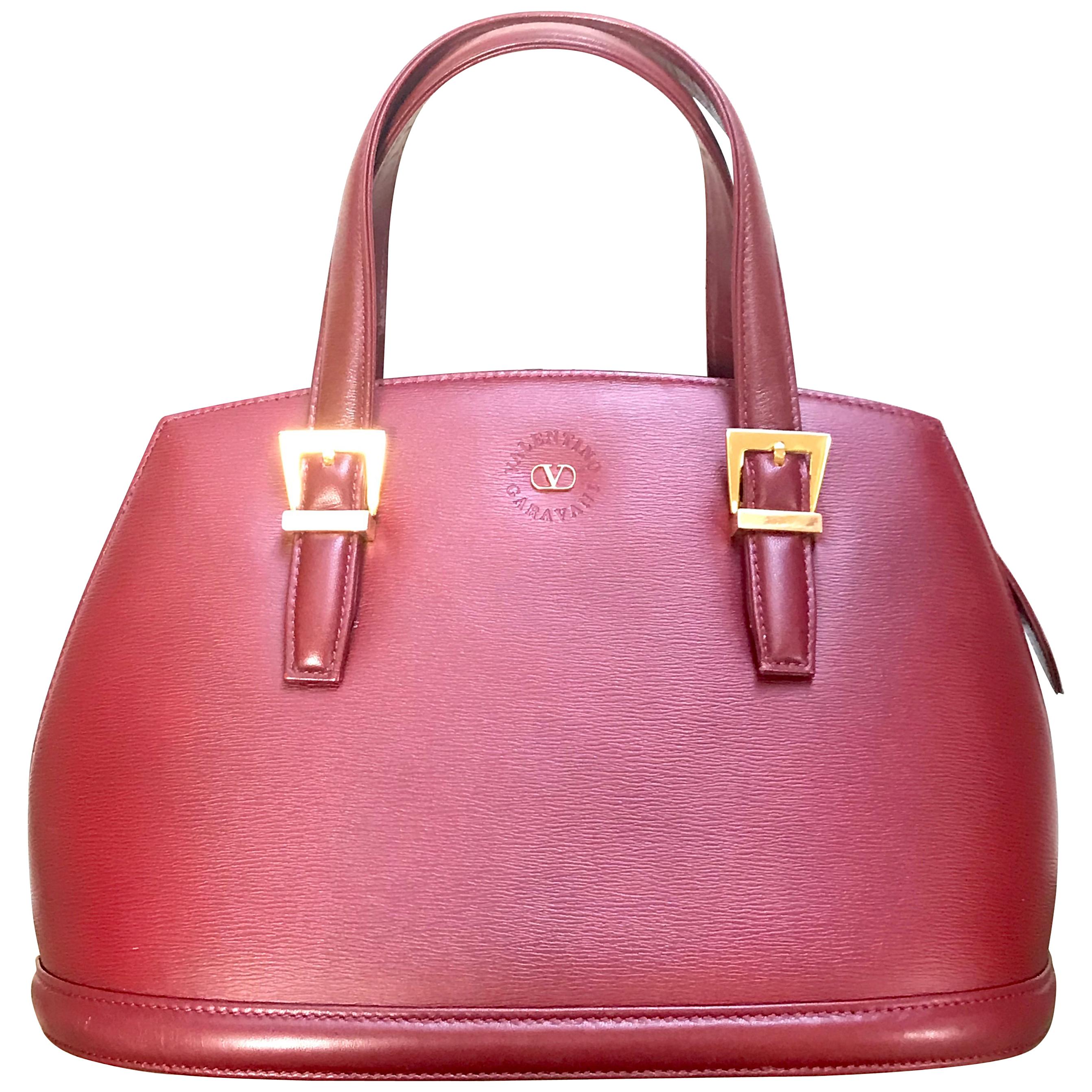 Vintage Valentino Garavani wine leather handbag with golden buckles. Classic bag For Sale