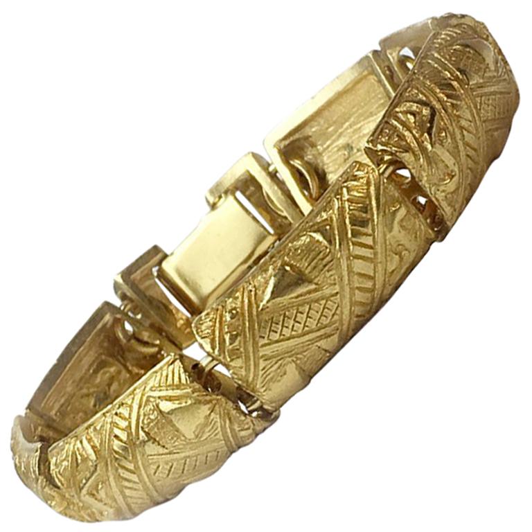YVES SAINT LAURENT Vintage Rigid Bracelet in Gilt Metal