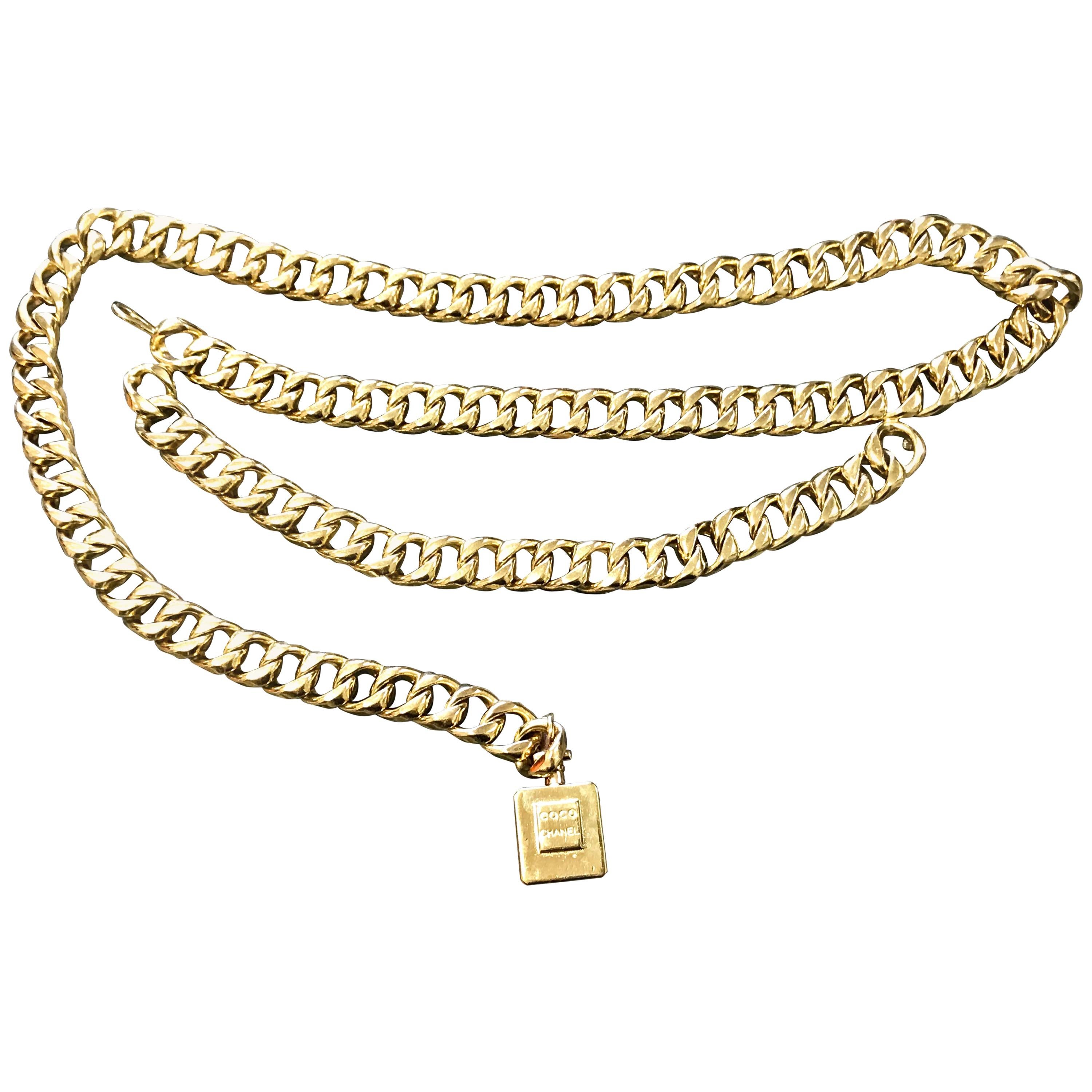 Vintage CHANEL golden nice and heavy thick chain belt with perfume bottle motif. For Sale