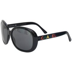 A Pair of 1990s Vintage Black Chanel Sunglasses