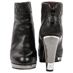 Used Chanel Low Boots in Black Lamb Leather and Palladium Silver Grille 