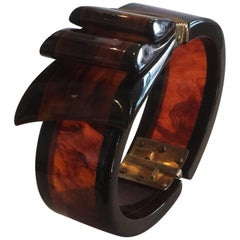 Rare Art Deco Black and Root beer bakelite ribbon hinged clamper bangle