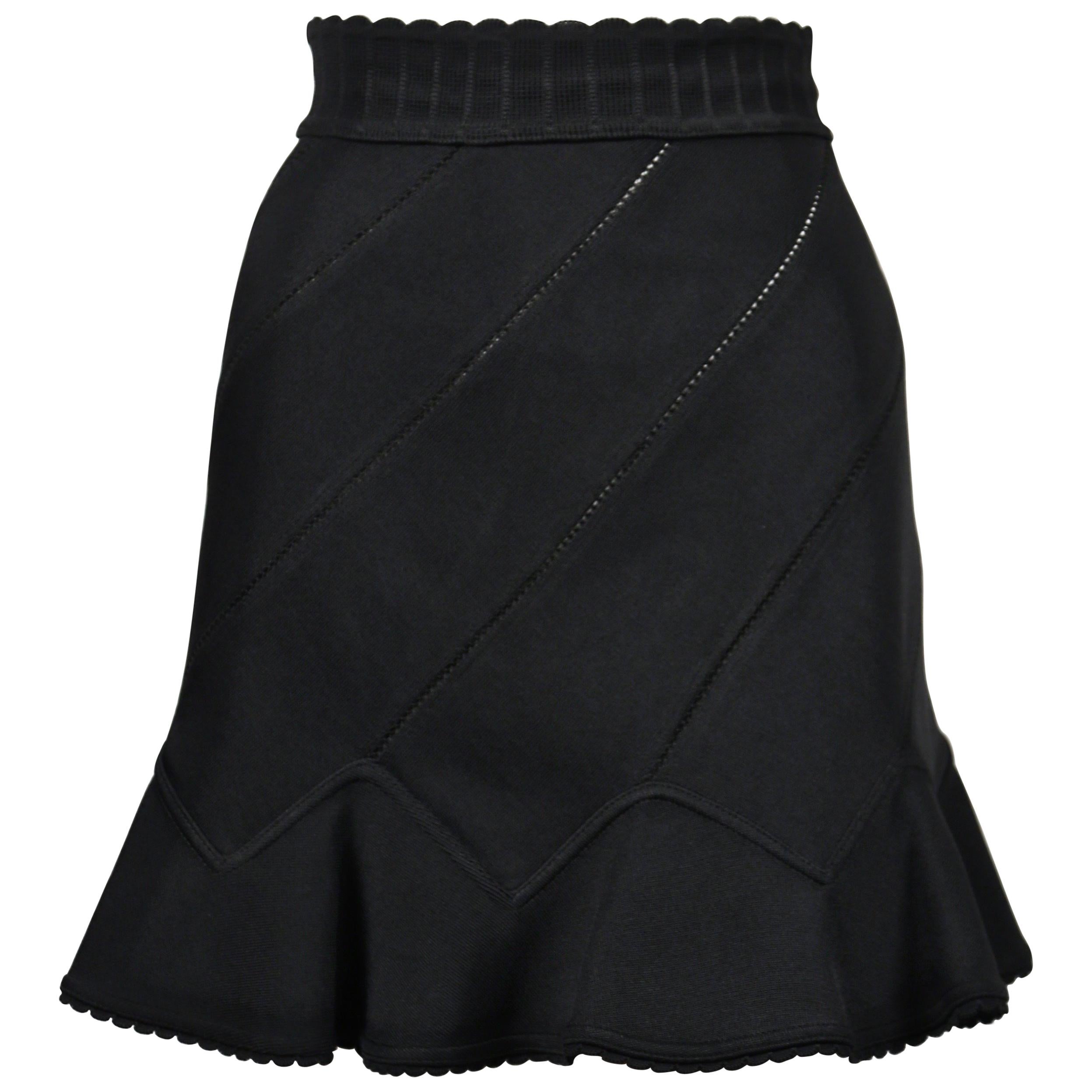 1992 AZZEDINE ALAIA black pointelle knit skirt with spiral seams & flounced hem