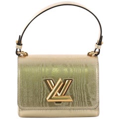 Louis Vuitton Twist Handbag Gravity Gold Calfskin PM