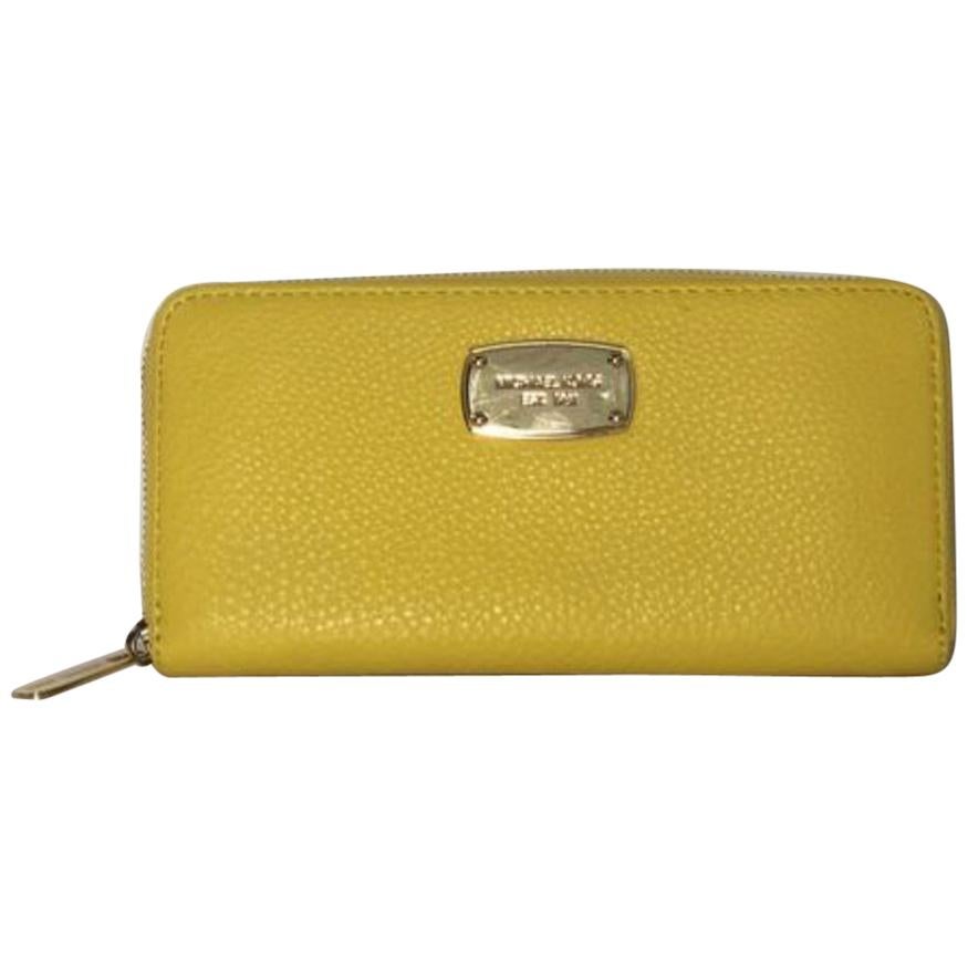 Michael Kors Leather Long Zipper Wallet in Yellow For Sale