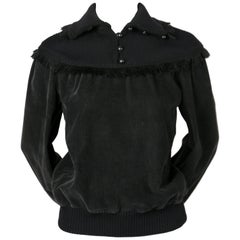 1977 SAINT LAURENT black corduroy sweater with fringed trim