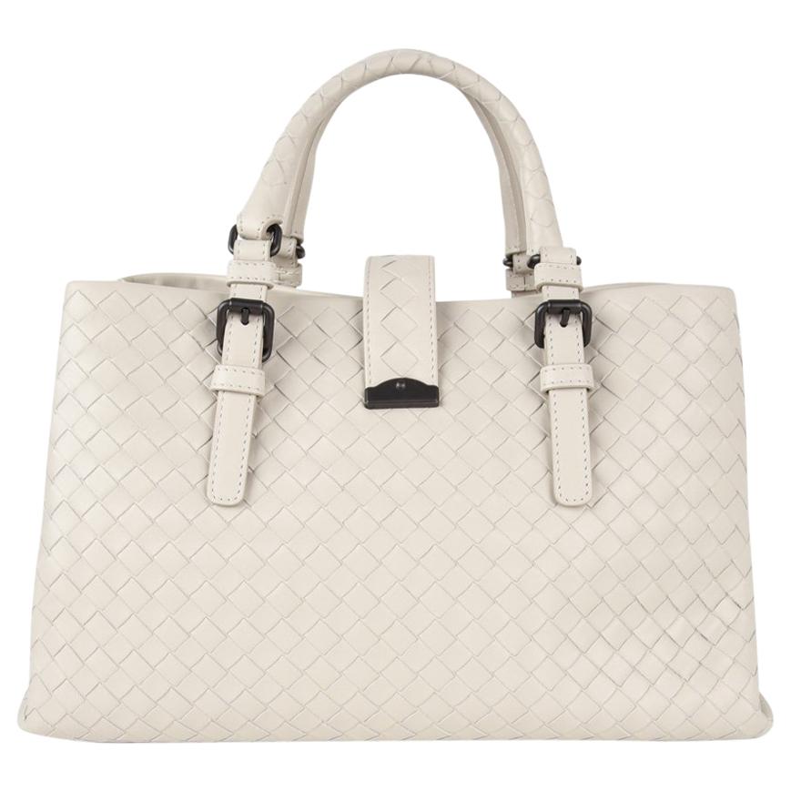 Guaranteed authentic Bottega Veneta iconic intrecciato butter soft calf leather tote shoulder small Roma bag.
Timeless beton (concrete) tone makes this light weight neutral beauty perfect for year round wear.
3 roomy compartments.
Metal closure with