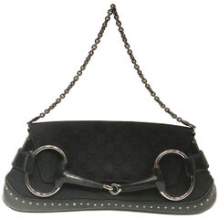 Vintage Gucci black canvas monogram horsebit clutch bag
