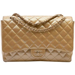 CHANEL Maxi Jumbo Bag in Gold-Tone Quilted Leather