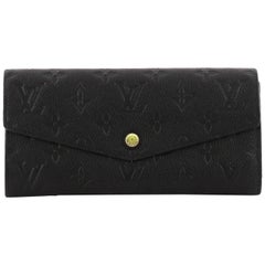 Louis Vuitton Tourterelle Monogram Empreinte Leather Pochette Felicie Bag  Louis Vuitton | The Luxury Closet