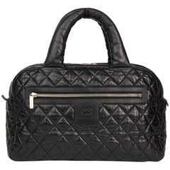 2000s Chanel Black Quilted Lambskin Coco Cocoon Bowling Bag