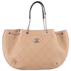 Chanel CC Lock Chain Bucket Bag Quilted Caviar Medium
