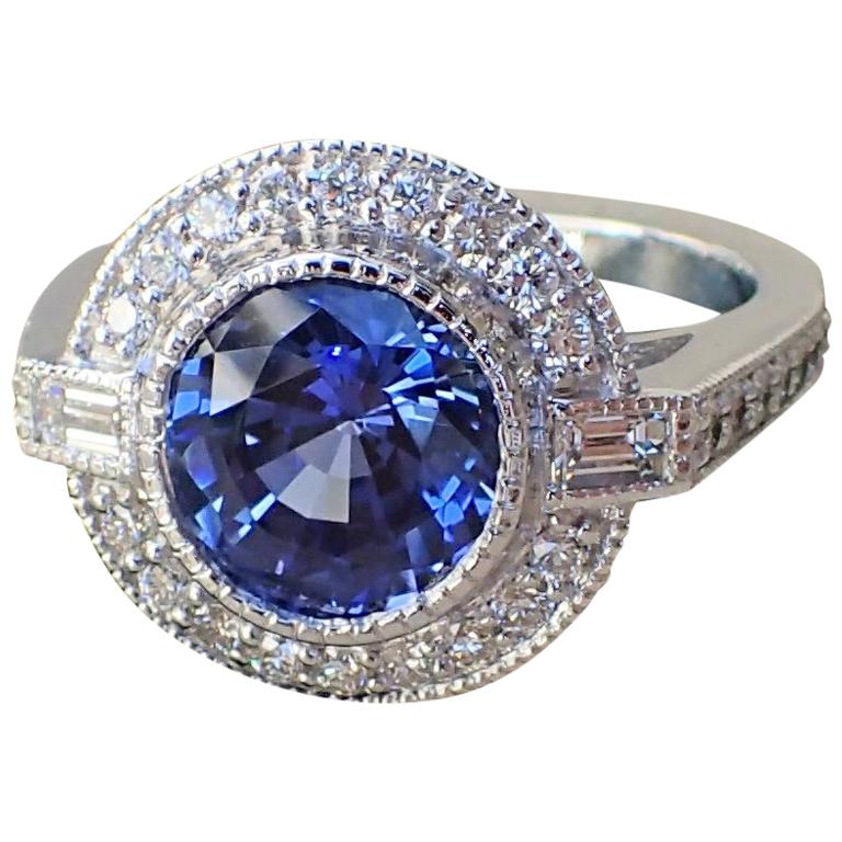 18k White Gold Ring with 3.93 carat Chatham Sapphire and 0.61 carats of Diamond For Sale