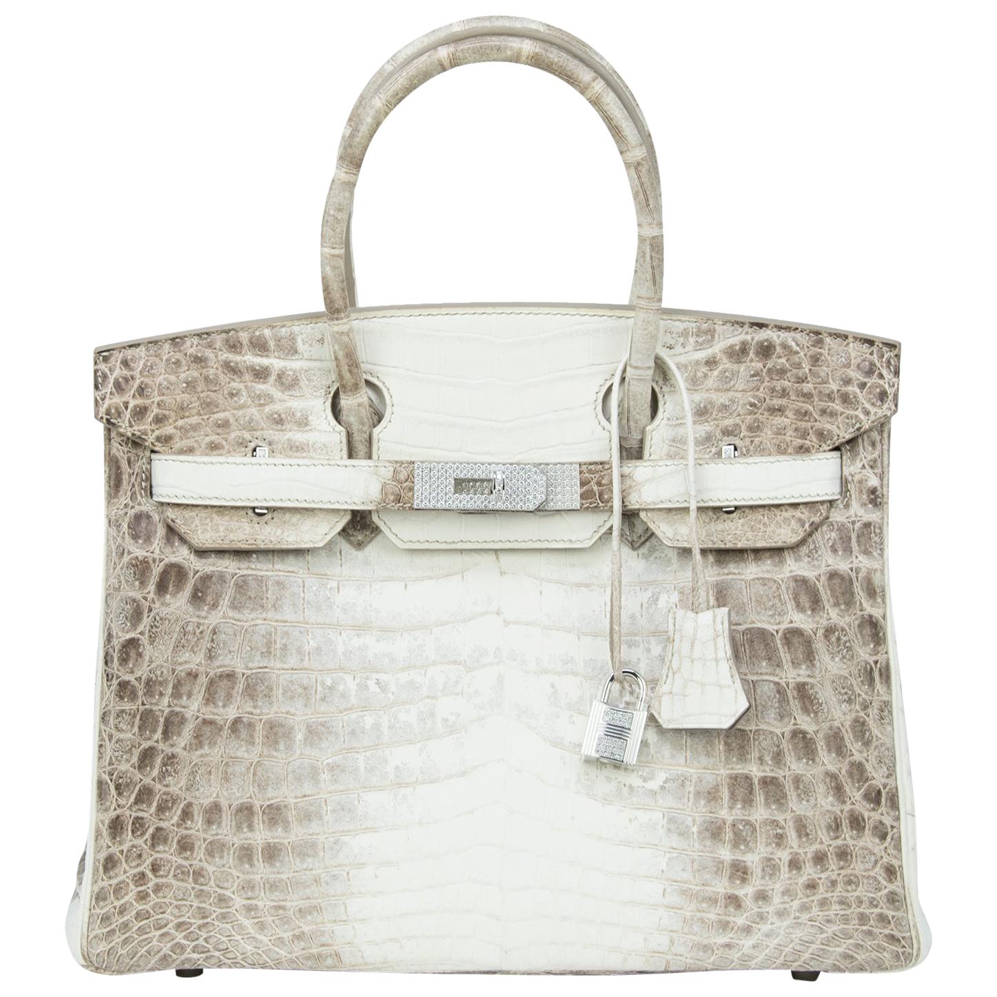 This is a most rare offering of the highly collectible Himalayan collection produced by Hermes. Absolutely breathtaking and spectacular, the Diamond Himalayan Birkin is teaming up with the matching Kelly GM Himalayan Diamond Bracelet, a most coveted