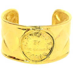Chanel, 90
s, Goldtone Quilted Cuff Bracelet w/ Center Logo