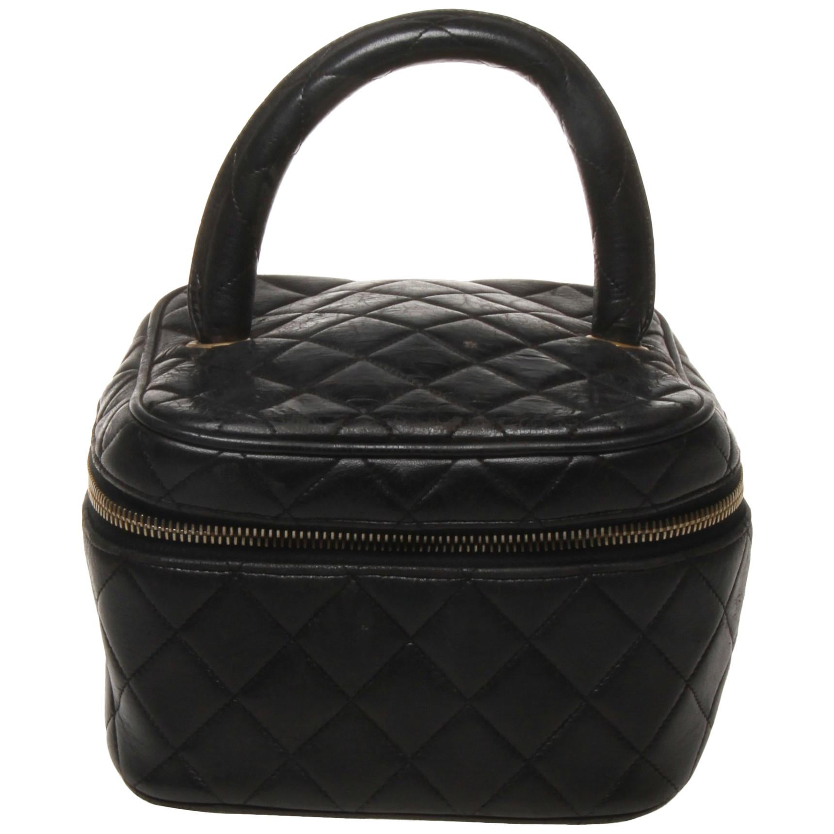 Chanel black quilted makeup case 