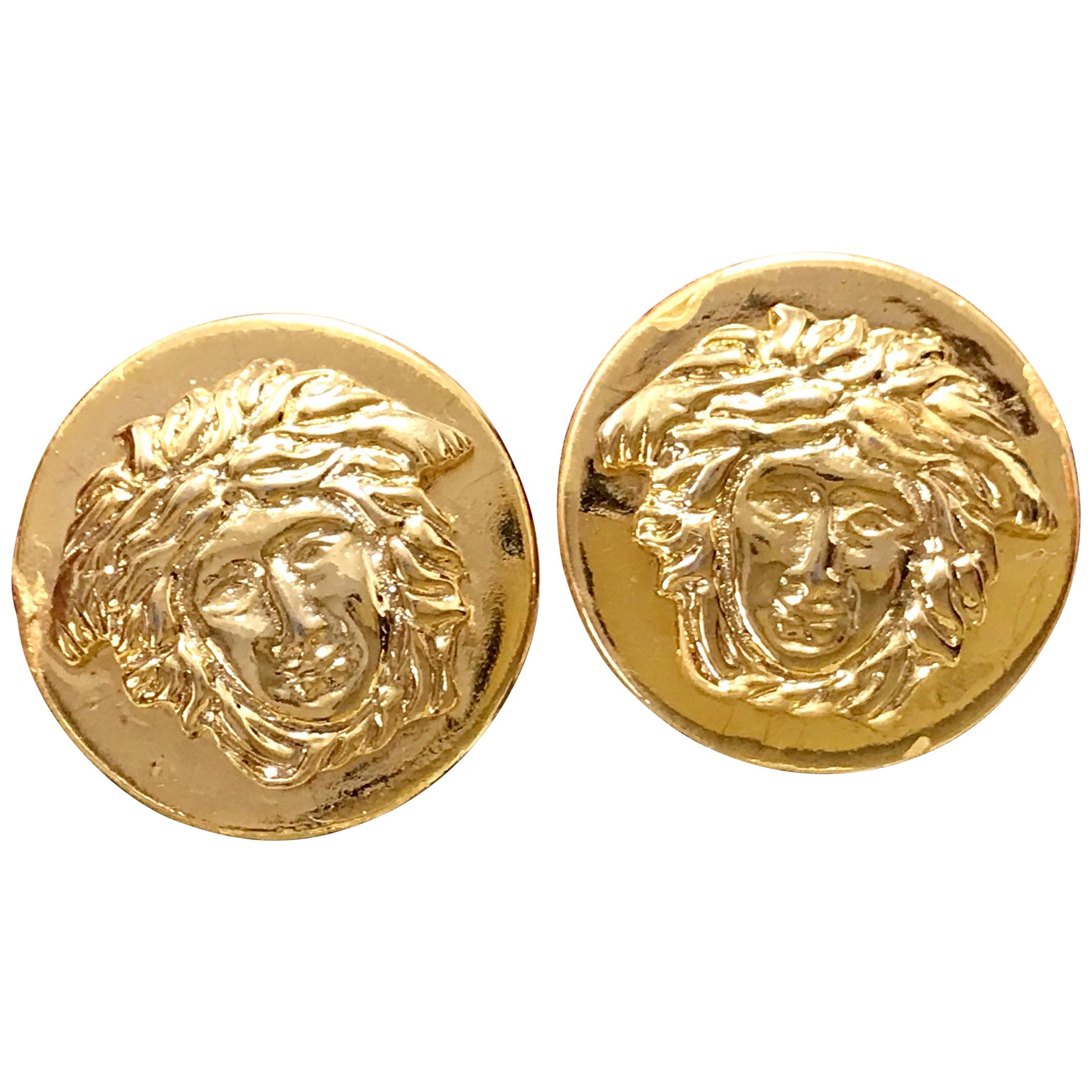 Vintage Gianni Versace golden round medusa motif earrings. Lady Gaga style. For Sale