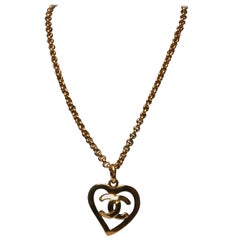 Chanel heart shaped pendant with CC logo