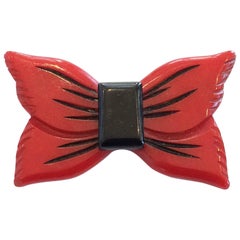Vintage Art Deco Red Bakelite bow or ribbon brooch pin